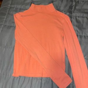 Peach colored long sleeve